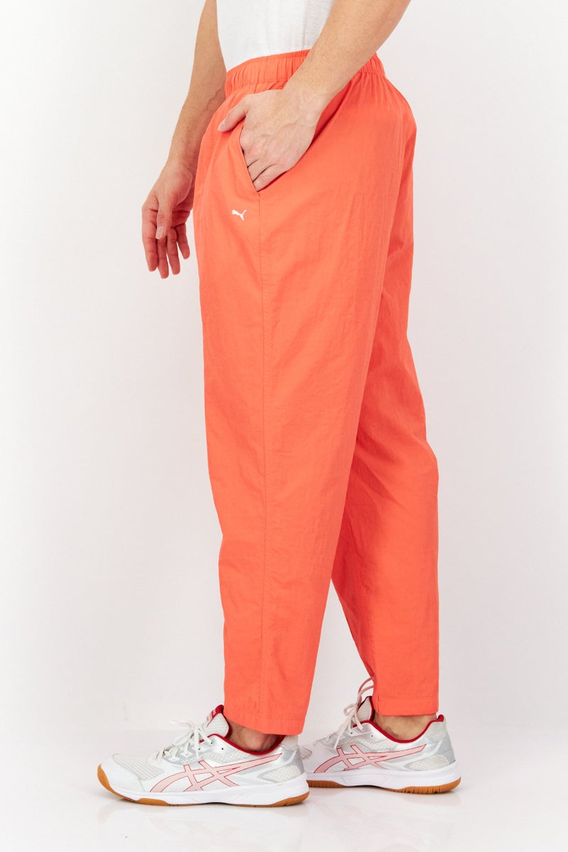 PUMA سروال رياضي خارجي للرجال، كورال - Image 3